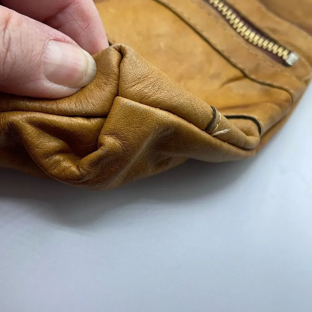 Vintage boho Leather Made in Hong Kong top handle bag.